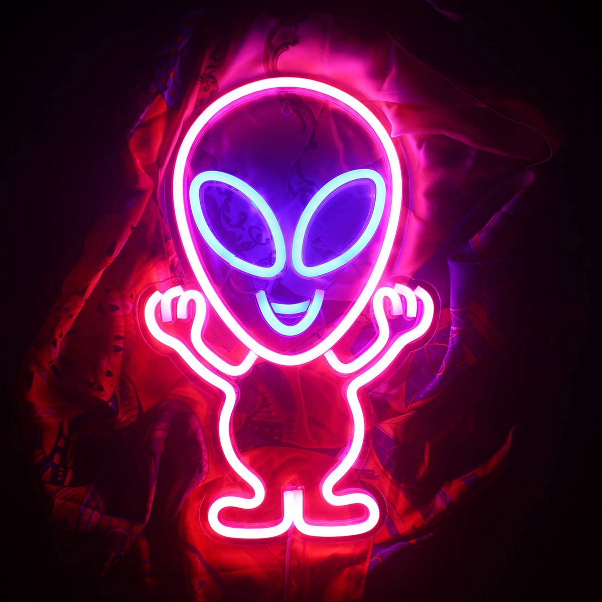logotipo de neón led que brilla en la pared - extraterrestre