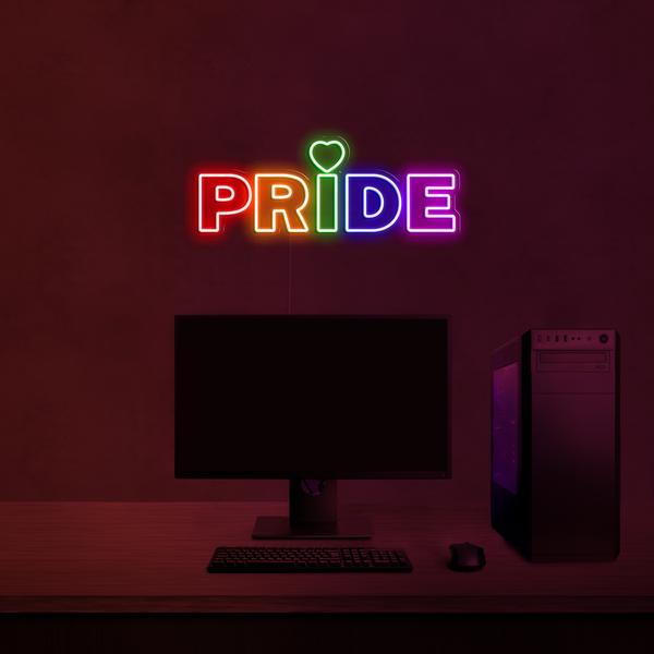 Letrero LED de neón 3D en una pared multicolor - ORGULLO